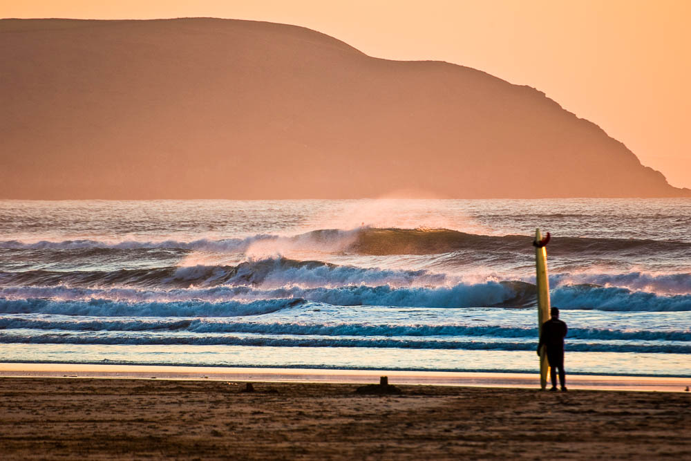 Longboarder Checking Out the Surf at Woolacombe